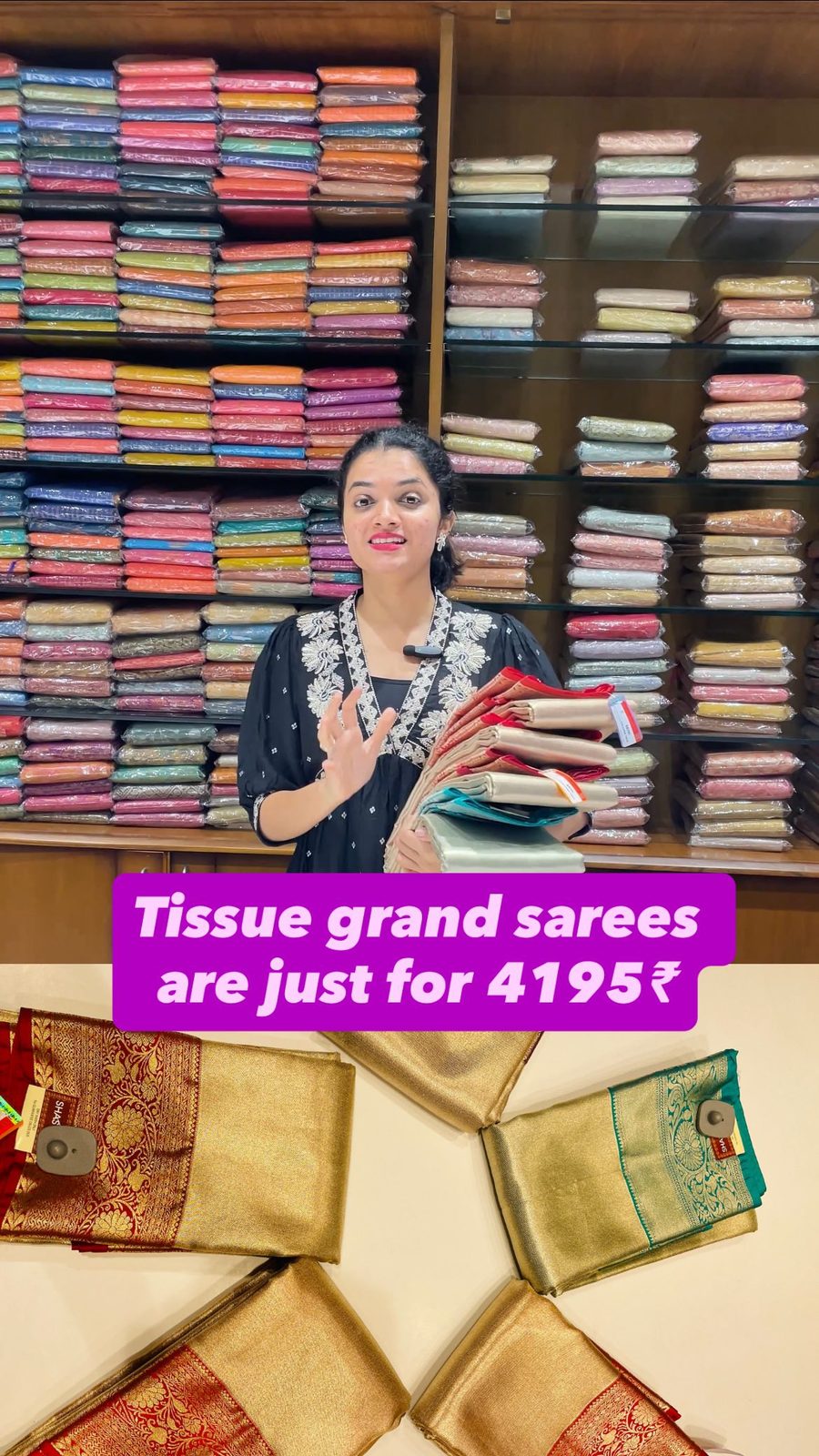 Model wearing a red chiffon georgette saree with silver border inside the Shasthas store