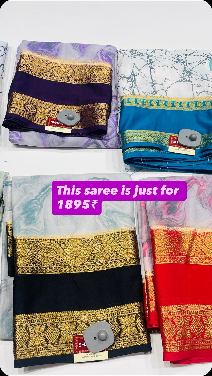 Stacked sarees in a 1299-rupee display with the price caption "This saree is just for 1299"